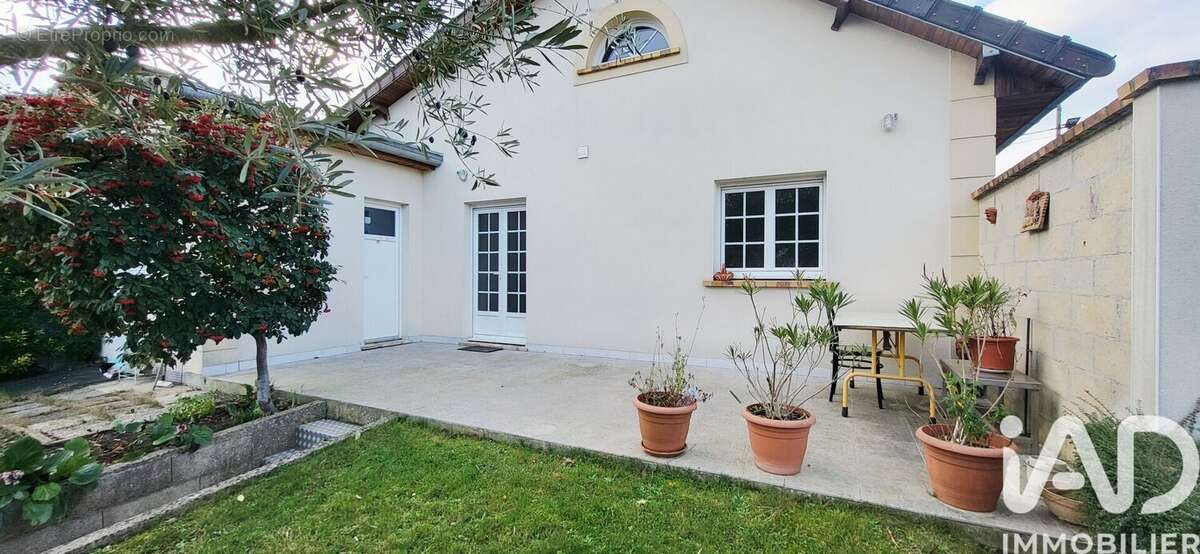 Photo 2 - Maison à TREMBLAY-EN-FRANCE