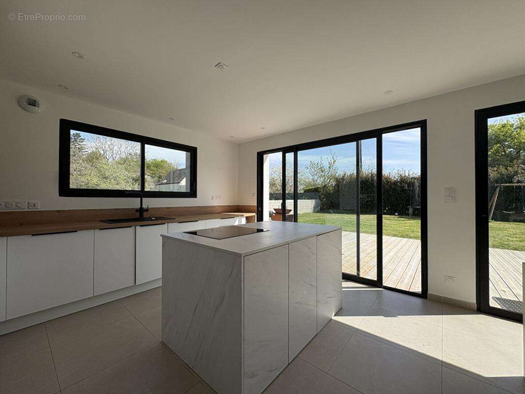 A vendre RIEC SUR BELON (29340) Maison 6 pièces 4 chambres 119 m2 - photo 7