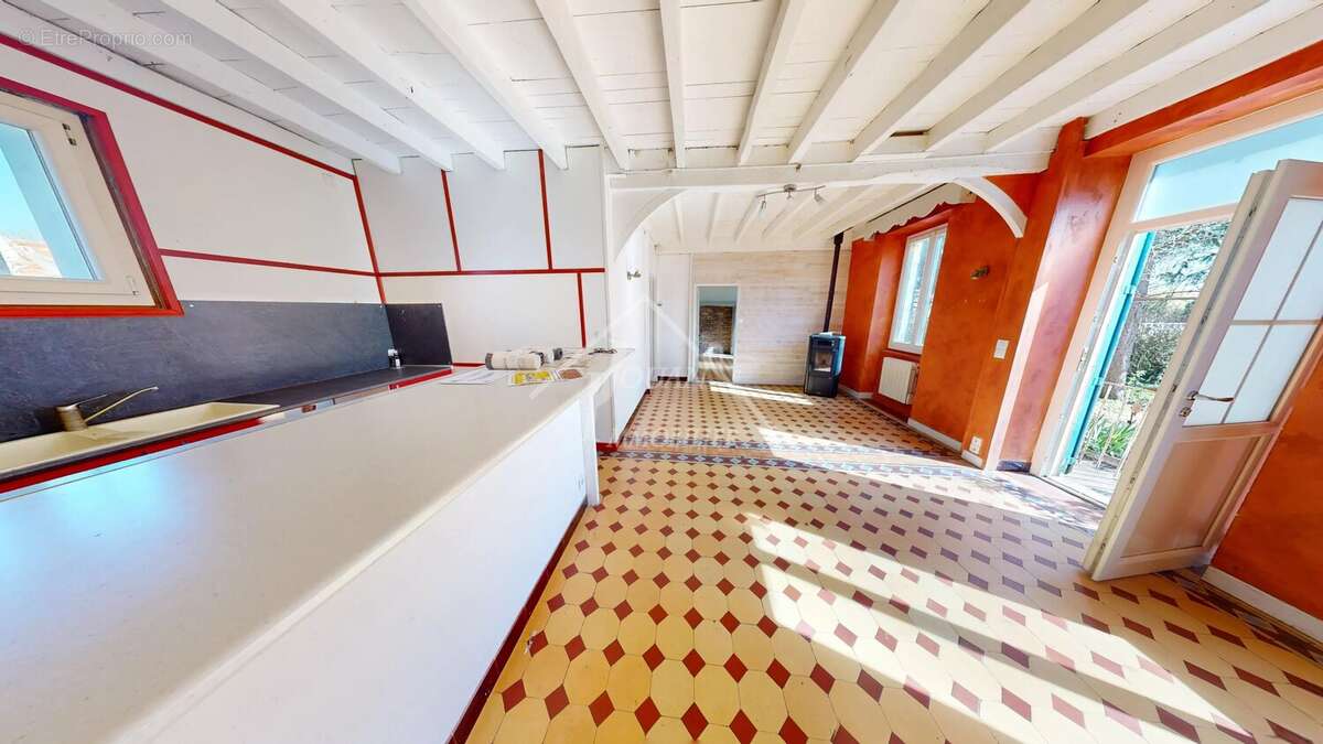 Maison à ETROUSSAT