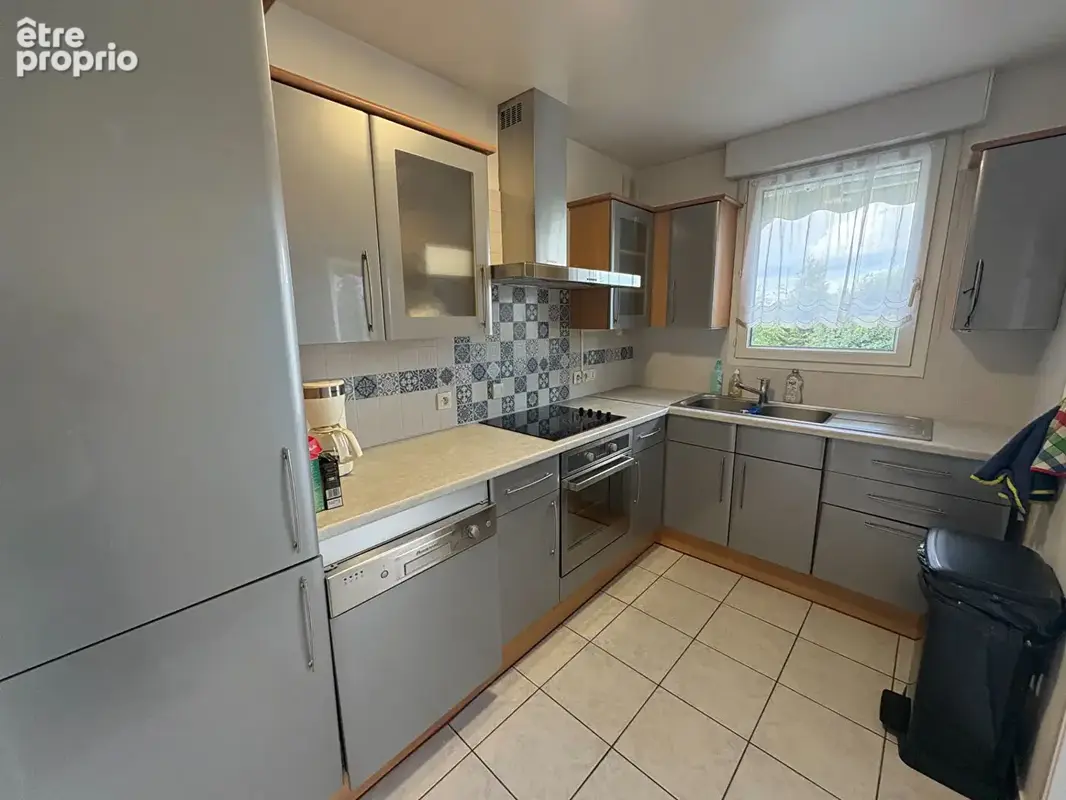 HAUBOURDIN - Appartement 3 pièces de 69 m² avec balcon plein sud, garage et parking - photo 5