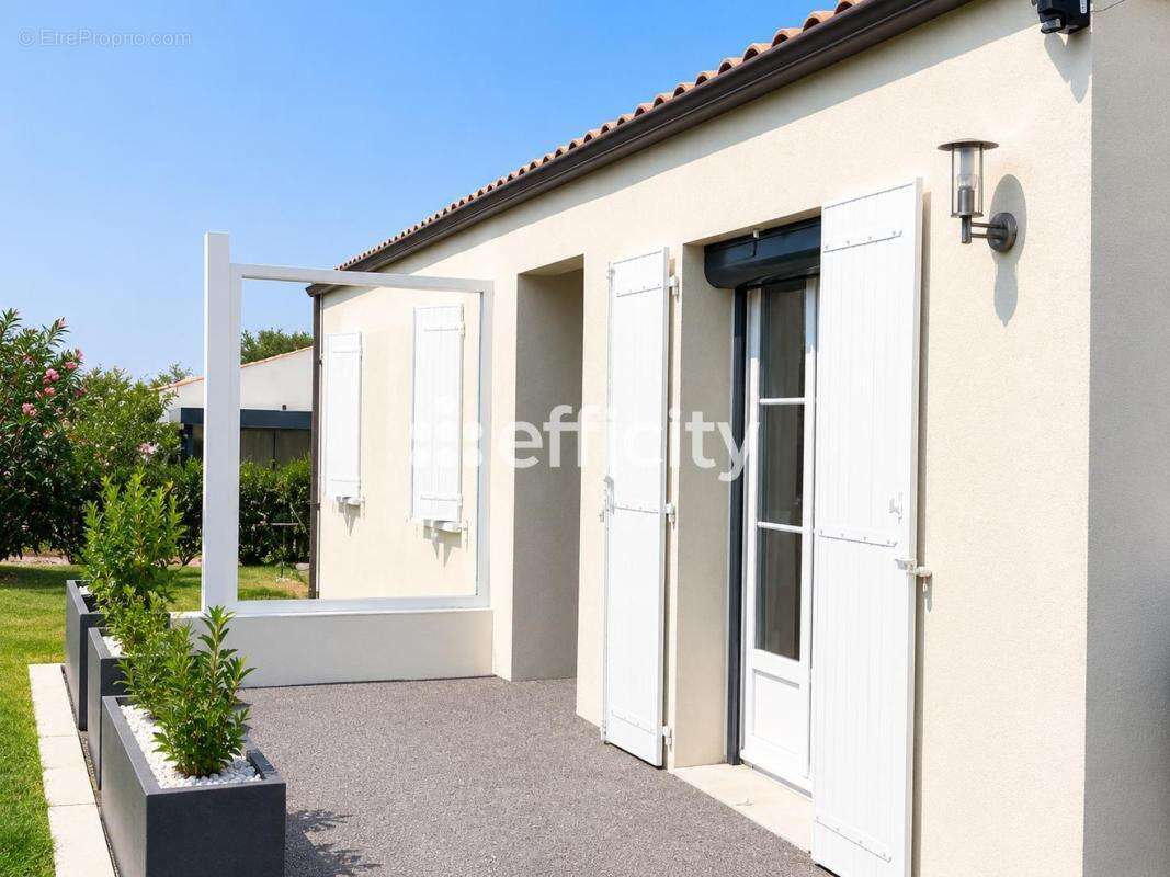 Maison 108 m² à Semussac  - photo 2
