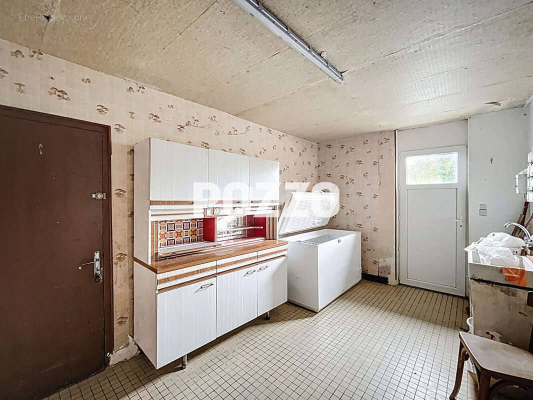 Maison à JUVIGNY-LE-TERTRE