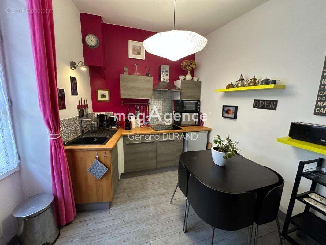 Maison authentique en pierres et poutres apparentes contenant 3 appartements - photo 3
