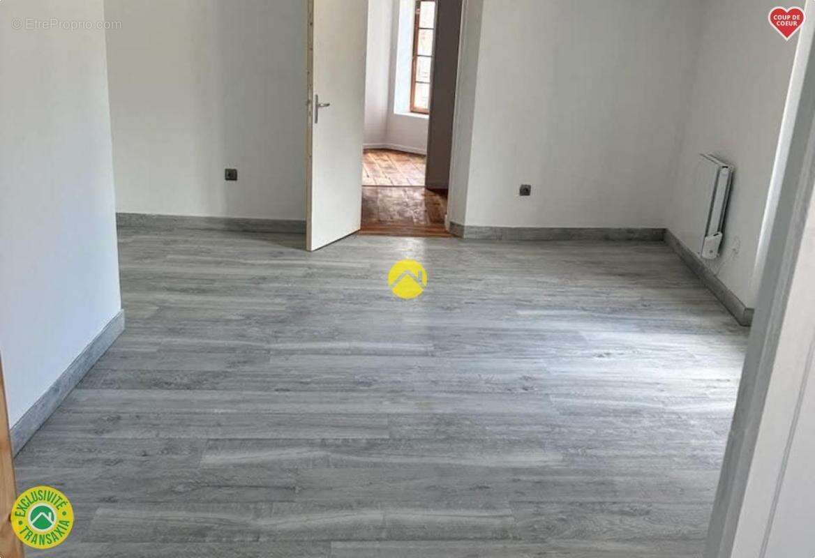 Logement rénové sans terrain - photo 4