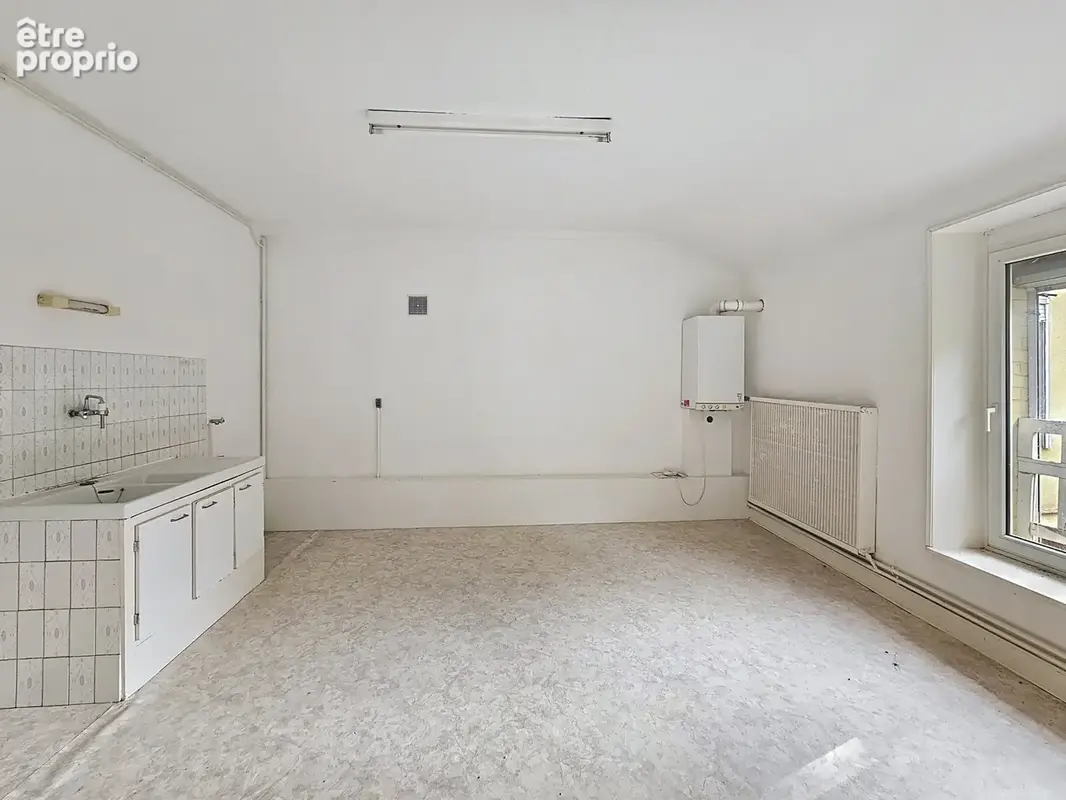 Immeuble de rapport - 6 appartements + 1 local professionnel - photo 8