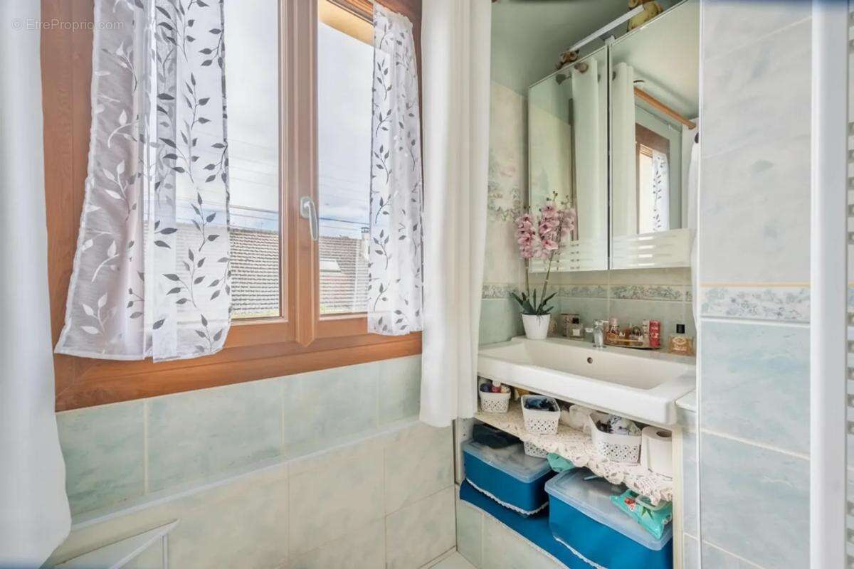 Maison de 5 pièces de 80 m² à Sainte-Geneviève-des-Bois - photo 10