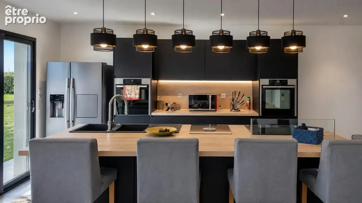Maison de 5 pièces de 139 m² au Thil - photo 6