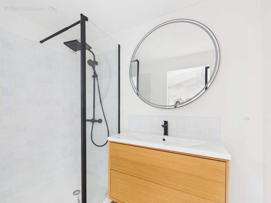 Duplex au charme historique de 102 m² - photo 8