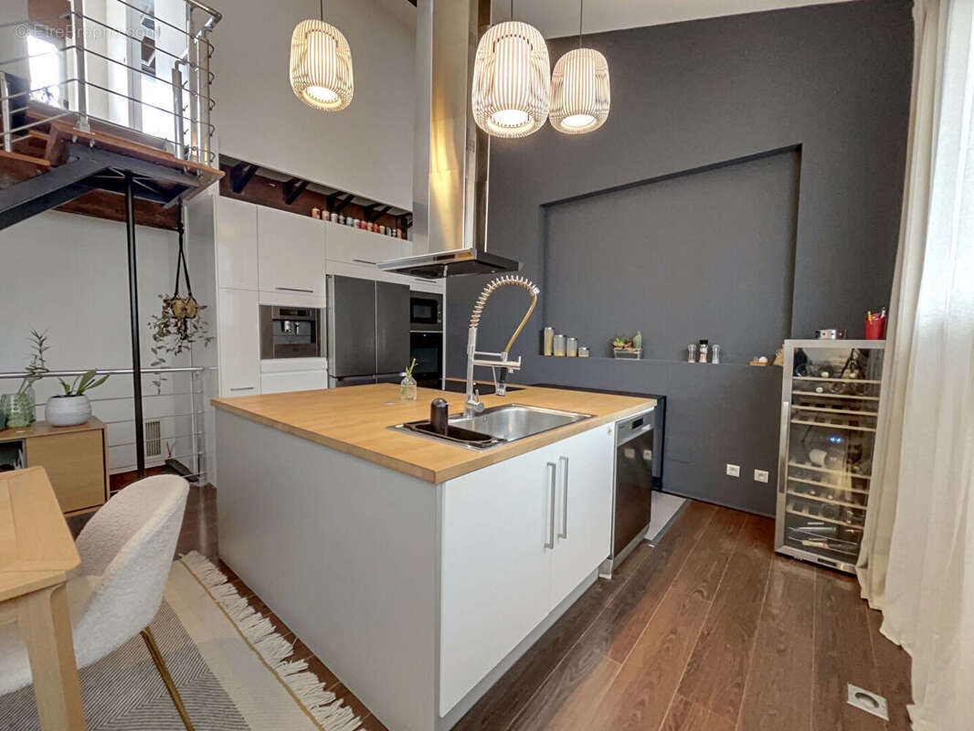 Duplex d'exception avec terrasse de 25m², spa et volumes rares - photo 5