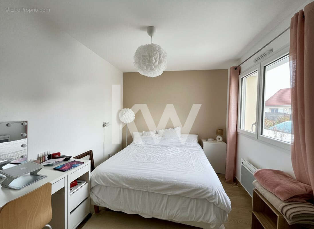 Maison 100 m² à Checy  - photo 6