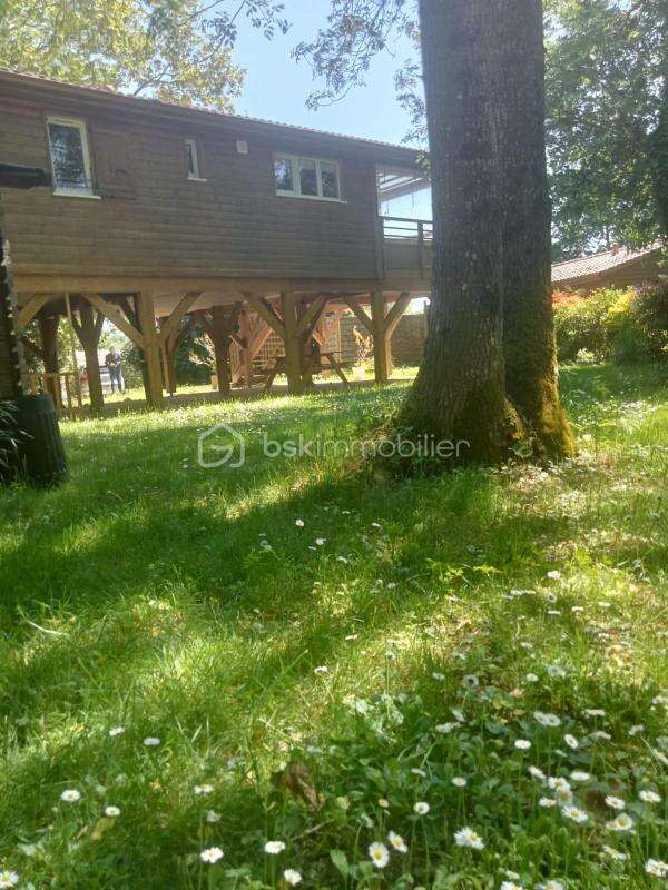 Chalet en vente - Vivez le charme discret dans un cadre paisible - photo 3
