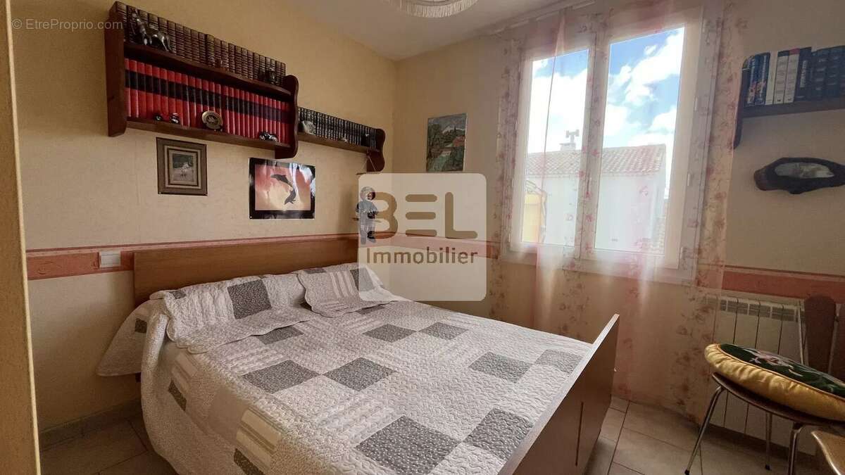 Maison à LAUDUN-L'ARDOISE