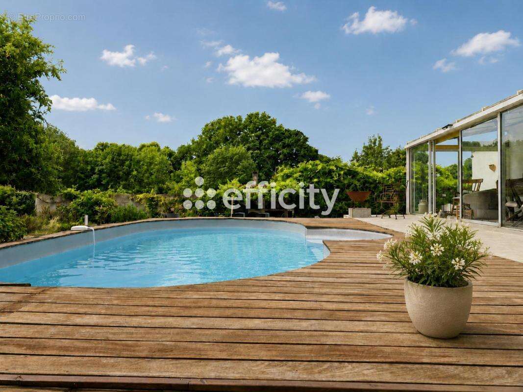 Maison 180 m² à Basse-Goulaine  - photo 2