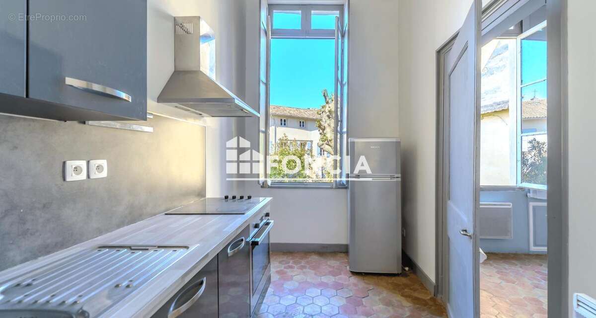 Exclusivité : T3 traversant de 71.38 m² dans un ancien hôtel particulier, Avignon Intra-Muros - photo 6