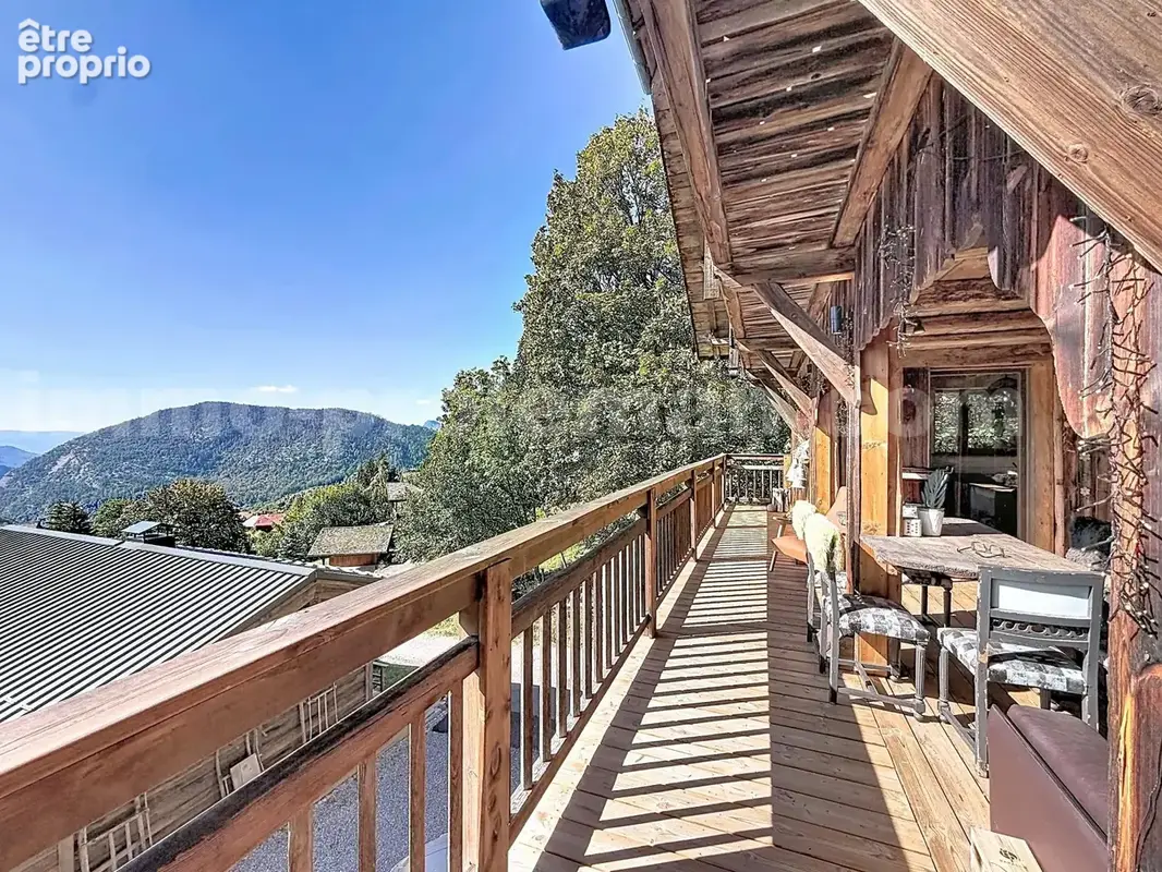 Appartement_T4_Araches_la_frasse_les_carroz_terrasse_balcon_belle_superficie_proche_prox_frontière_Suisse_direction_GENEVE_autoroutes_investissement_locatif_vente_vue_séjour_cuisine_ouverte_calme_nature