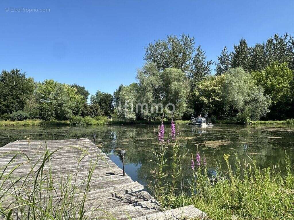 Terrain de loisir avec étang de pêche et roulotte - photo 10