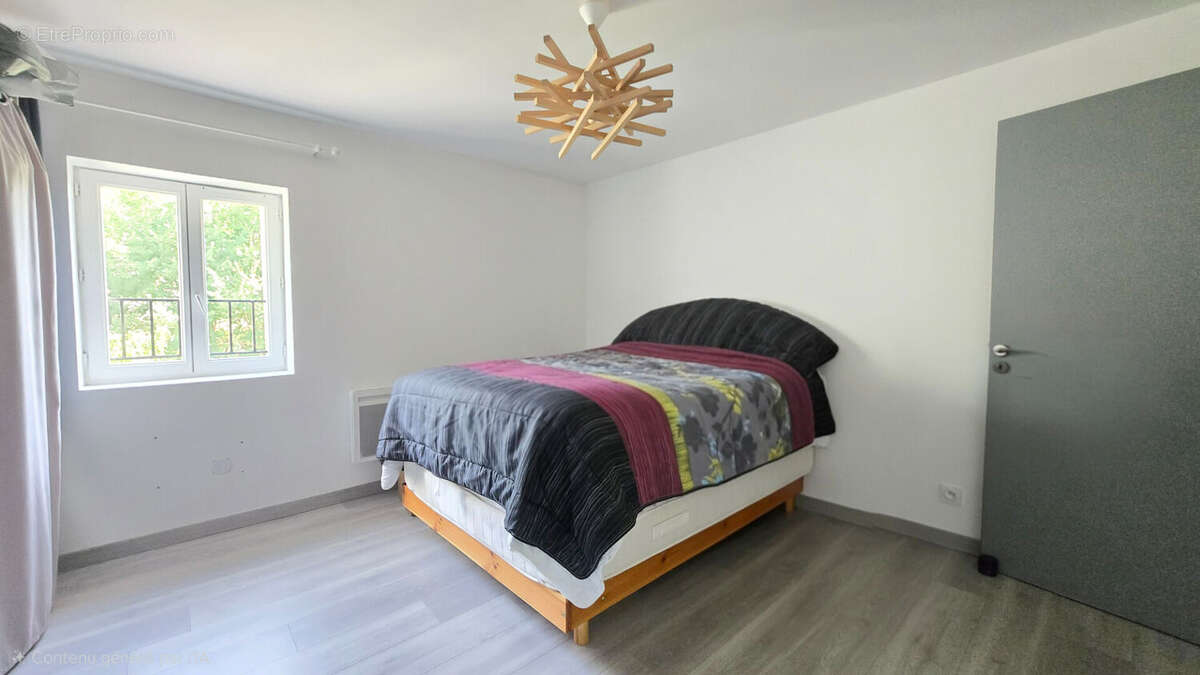 Maison T5 proche Ste Cécile d'Avès sur parcelle de 750m² - photo 11