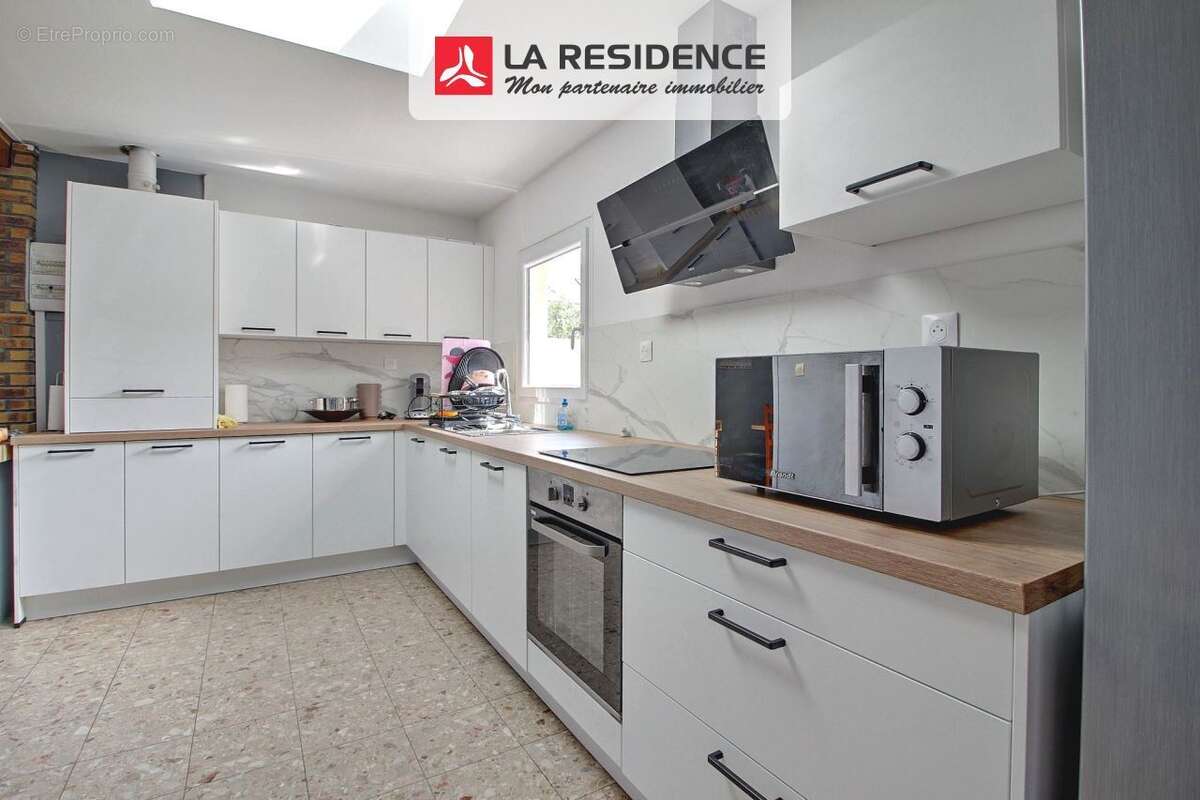 Maison 78 m² à Saint-Etienne-Du-Rouvray  - photo 3