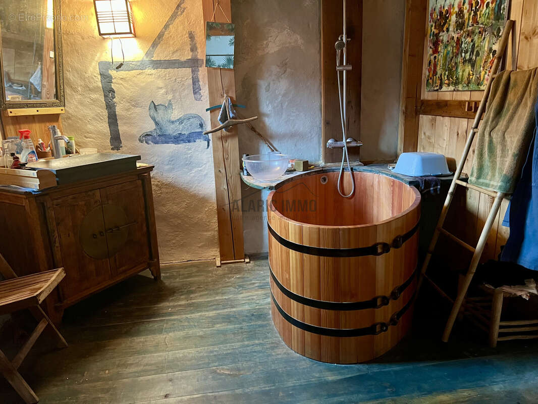 Ancienne remise aménagée type loft à fort potentiel - photo 16