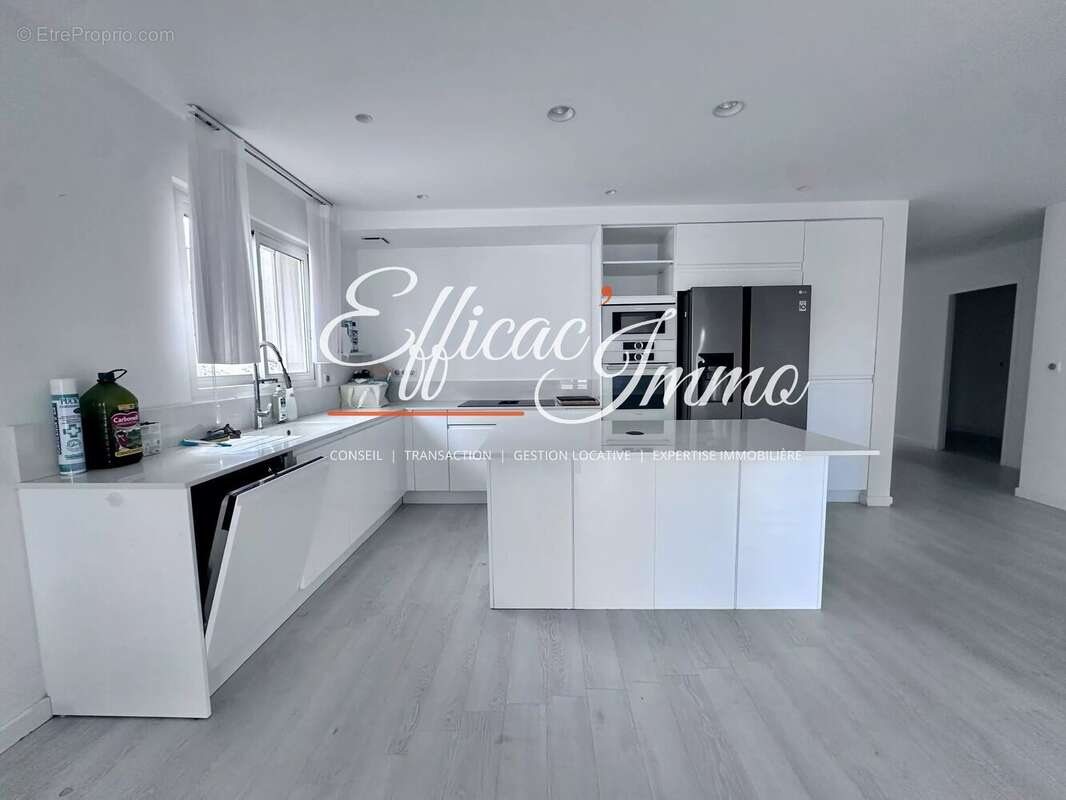 Bien à usage mixte de 154,51 m² avec garage, jardin et prestations haut de gamme - photo 4