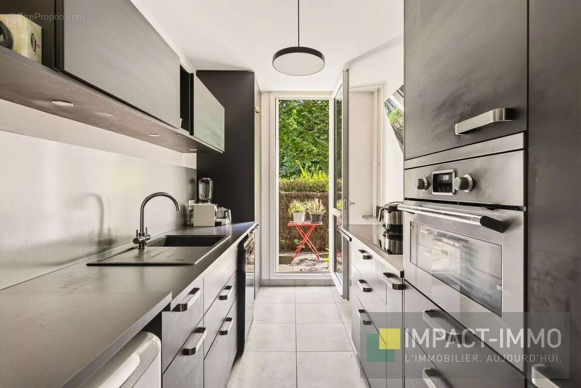 Puteaux – rez de jardin 3 pièces de 68 m² + jardin + terrasse + parking - photo 3