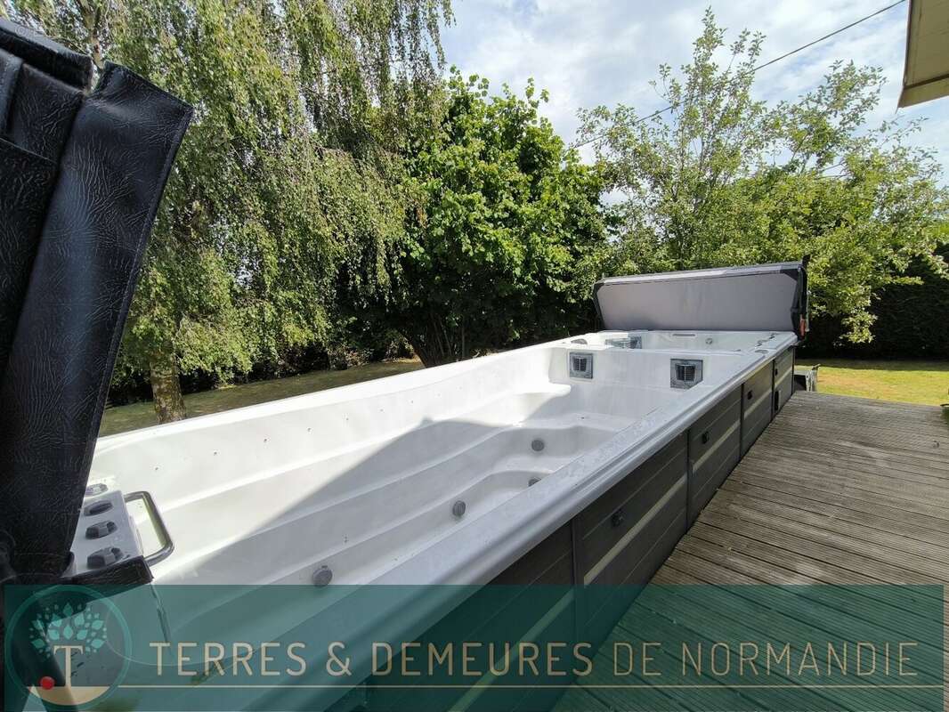 A 10 minutes de grand-bourtheroulde (27520), maison 4 chambres sur sous-sol, veranda et spa de nage sur terrain 1390 m². - photo 11