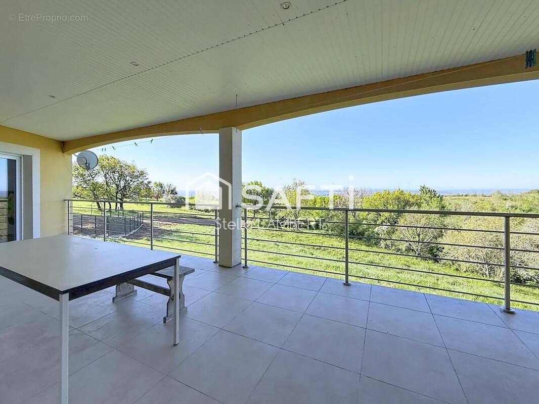 Photo 1 - Maison à CASTELNAU-D'ESTRETEFONDS