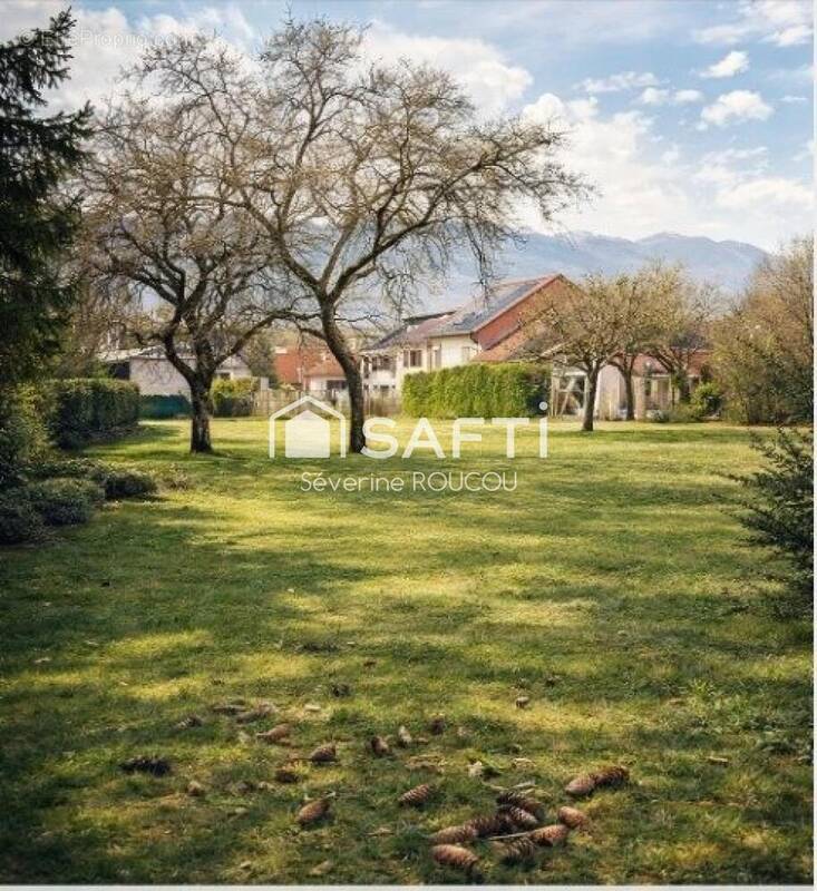 Photo 1 - Terrain à SAINT-GENIS-POUILLY