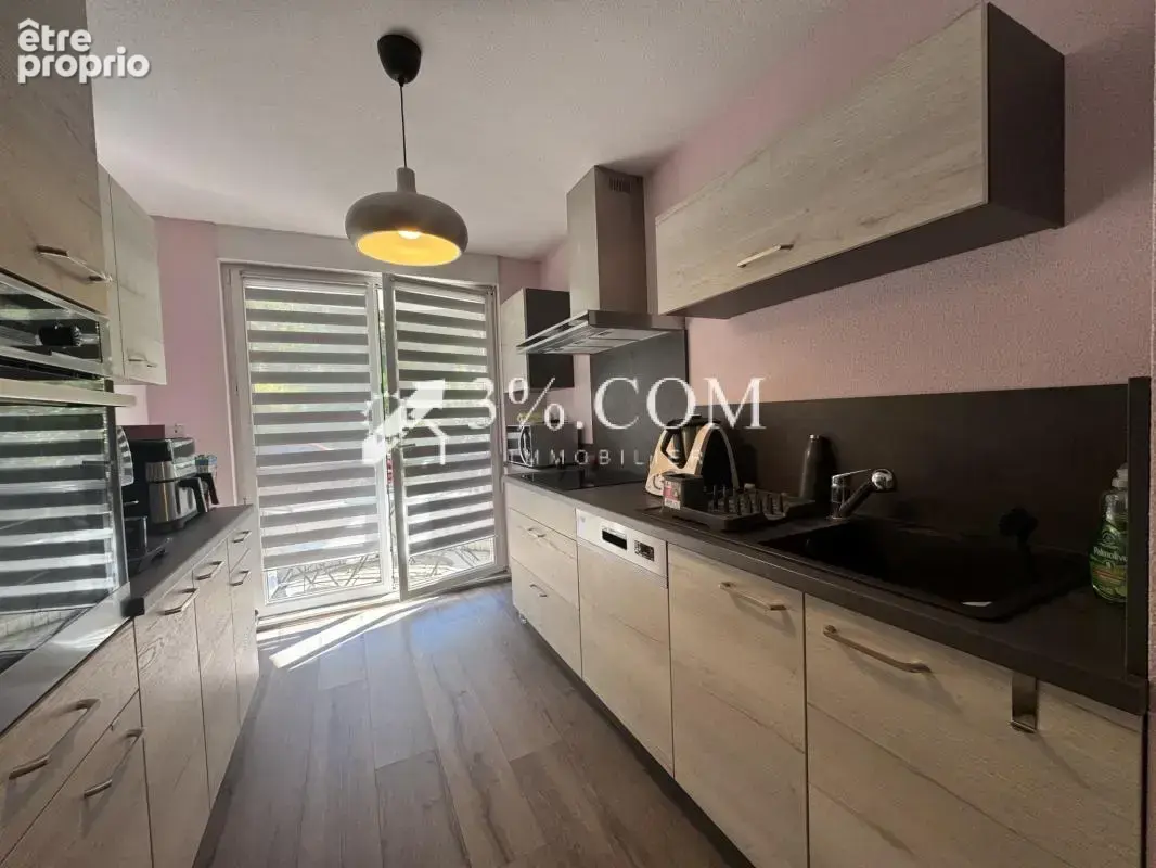 3%.COM - Appartement 2 pièces avec balcon, parking et cave - photo 3