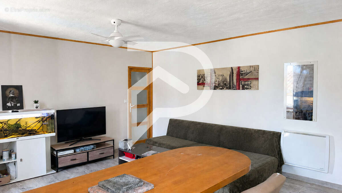 Appartement T2 rénové de 45 m² vendu loué Montredon-Labessonnié - photo 4