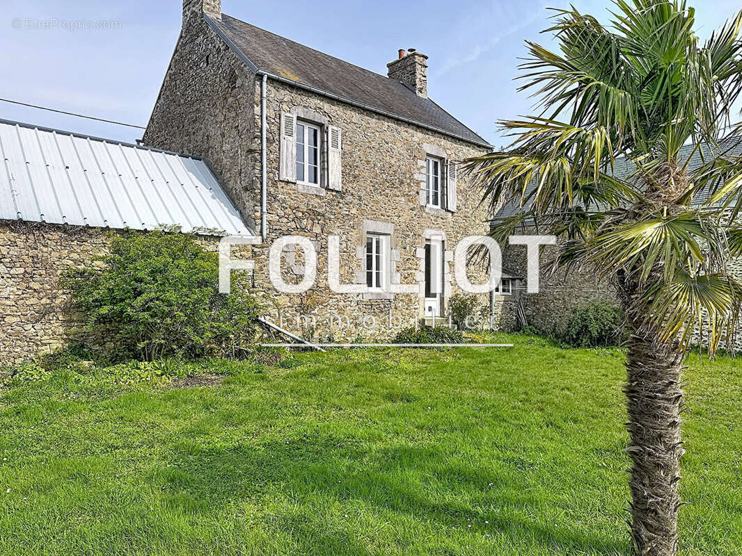 Maison à AGON-COUTAINVILLE