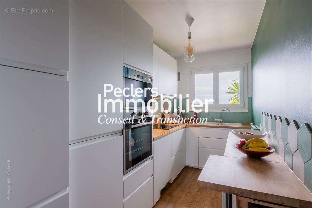 Appartement 3 pièces entièrement rénové coeur de ville - photo 5