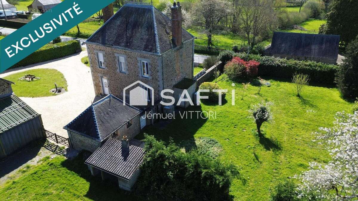 Photo 2 - Maison à SAINT-DENIS-DE-GASTINES