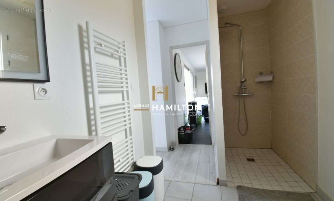 Maison moderne de plain-pied avec suite parentale et grand terrain - photo 17
