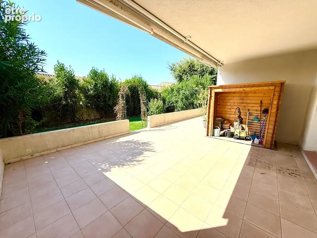 Appartement en rez-de-jardin avec terrasse et place de parking privative63,65 - photo 2