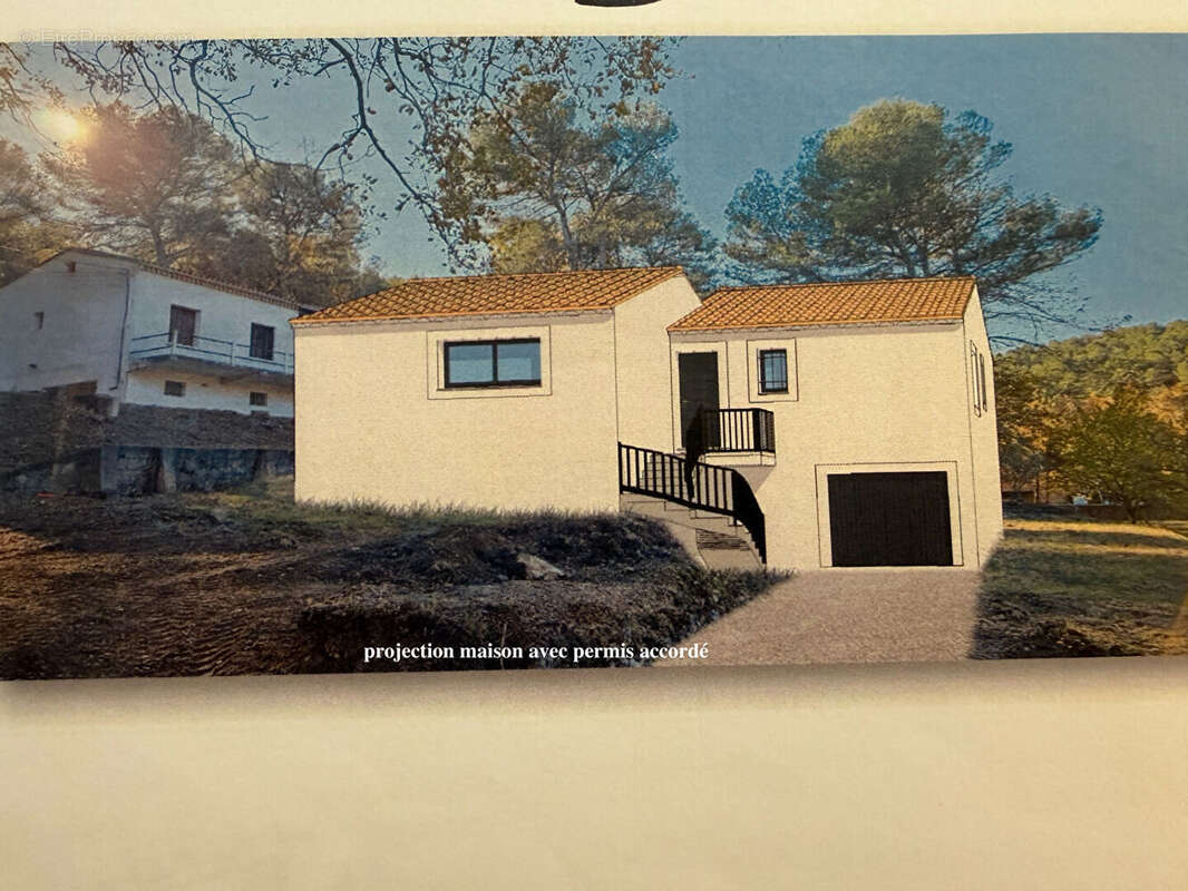 Terrain  627 m2 avec permis accordé pour maison 98 m2 hab avec sous-sol - photo 3