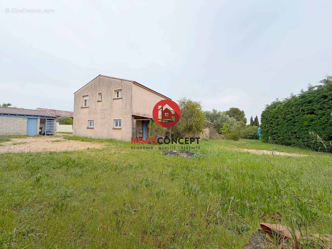 Maison à LAUDUN-L'ARDOISE