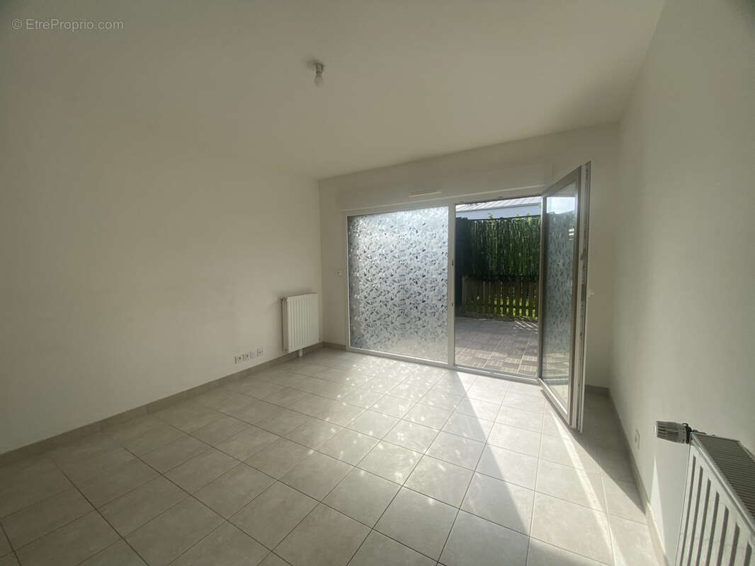 Appartement T2 en rez-de-jardin - cabanon et carport de stationnement - photo 2