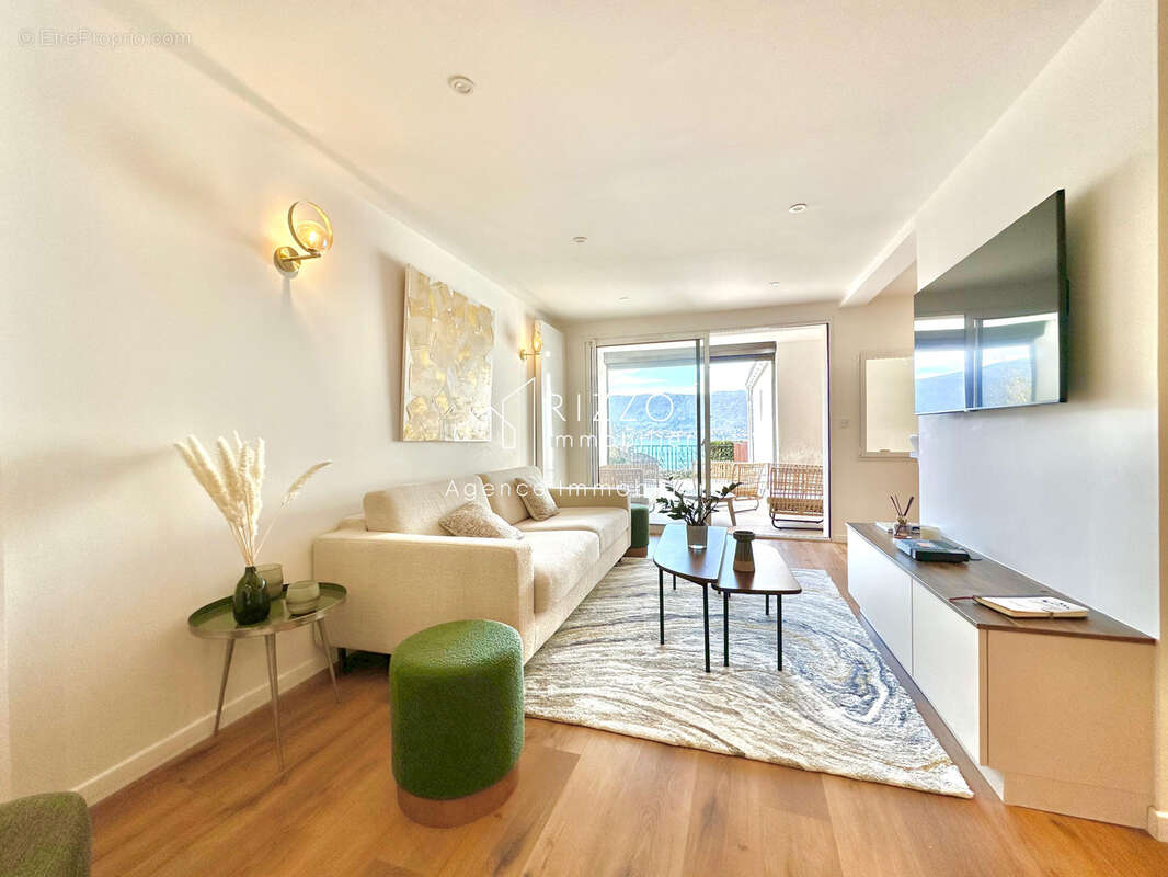 Appartement refait à neuf avec grande terrasse vue lac !!! - photo 6