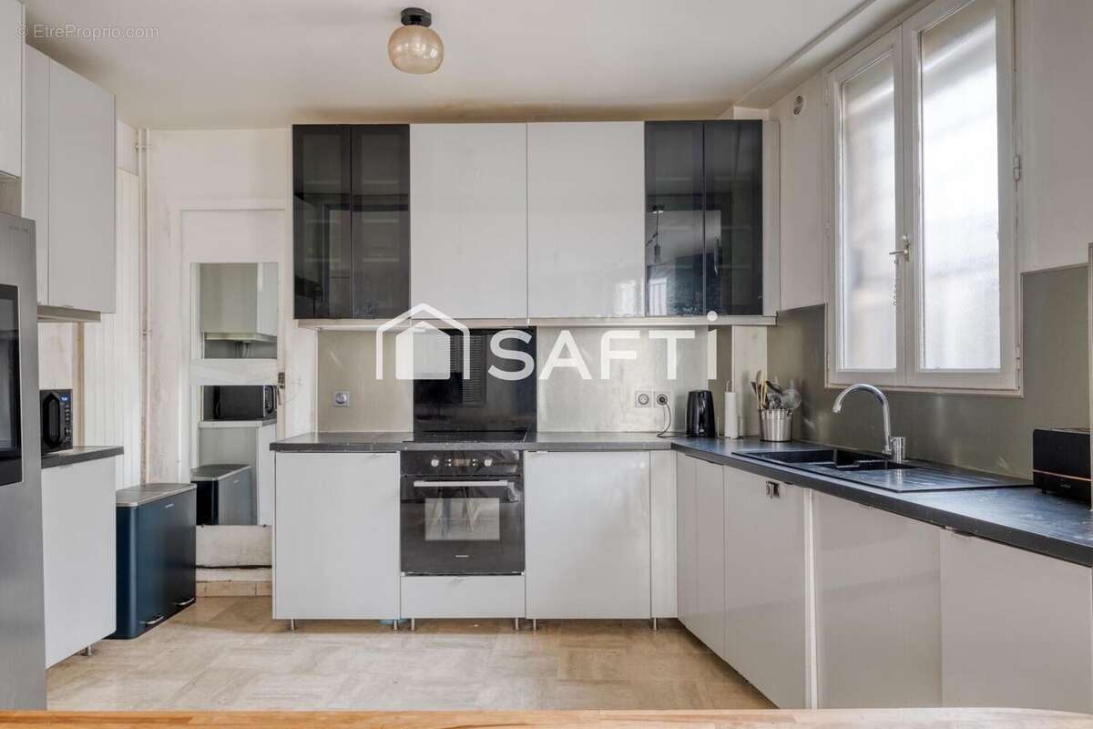 Photo 2 - Maison à PARIS-13E