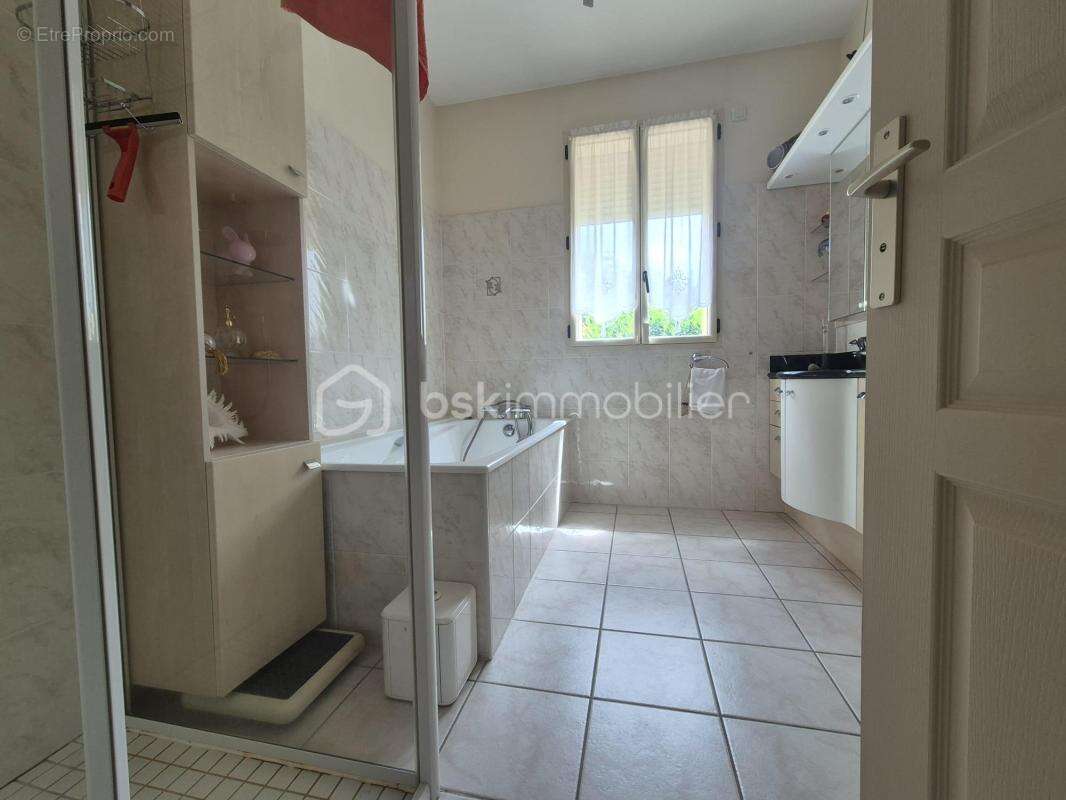 Maison de plain-pied de 124 m² - photo 9