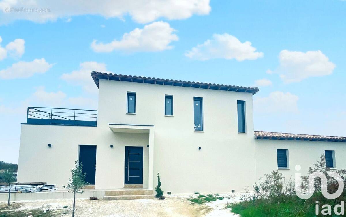 Photo 1 - Maison à LAUDUN-L&#039;ARDOISE