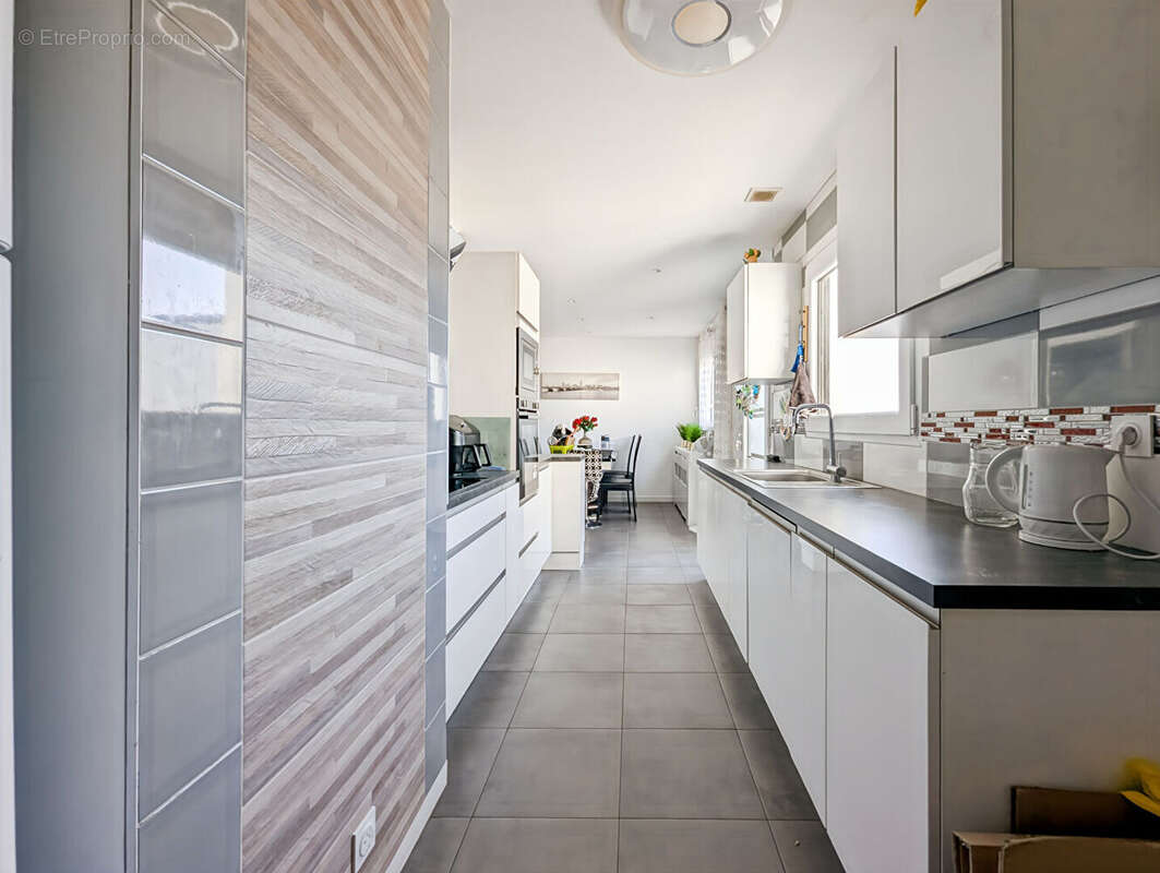 A vendre  SAINT AUBIN D AUBIGNE  maison familiale 4 chambres - photo 6