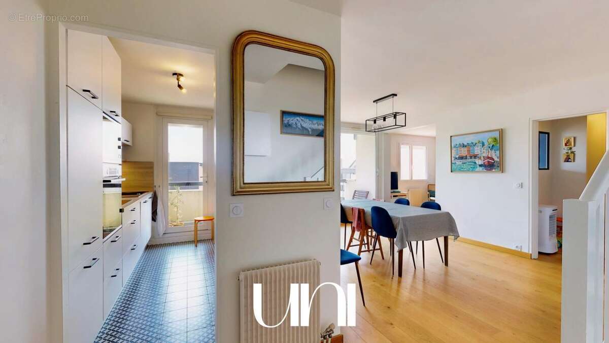 Appartement 5 pièces de 98 m2 avec caves, balcon, ascenseur et parkings - CAEN Saint-Gilles - photo 7