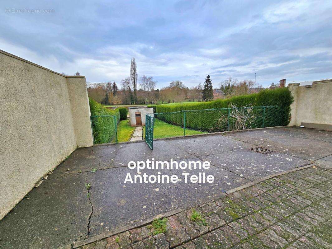 Le Cateau - Maison semi-individuelle à double accès avec garage, devanture & jardin clos sur 960m² - photo 12
