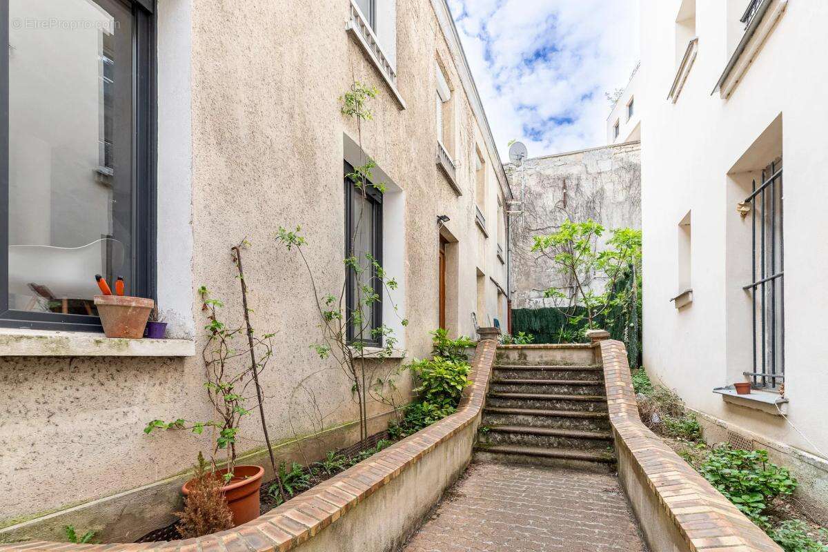 Maison rénovée 4 pièces de 85 m² Paris 19 - photo 12