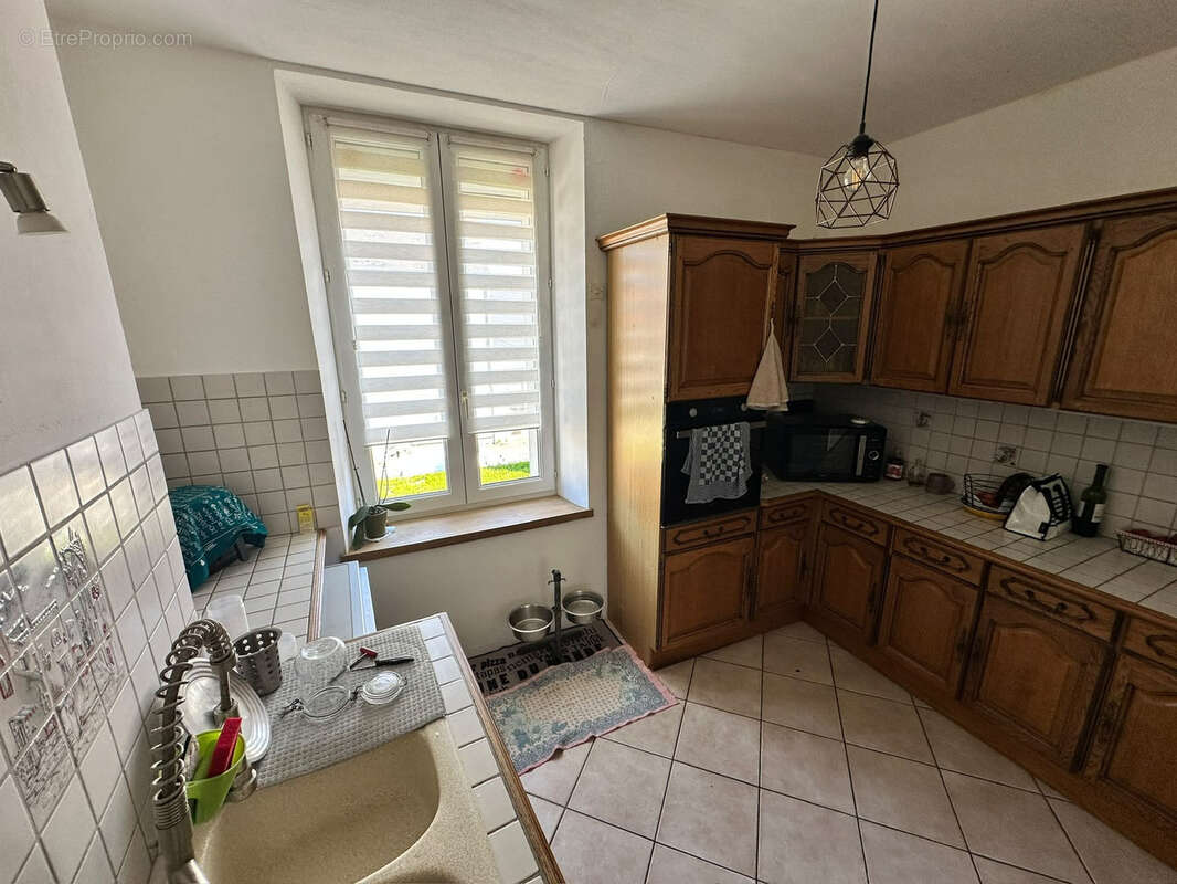 Appartement de caractère de 130 m2 en plein centre de Fay-aux-Loges - photo 2