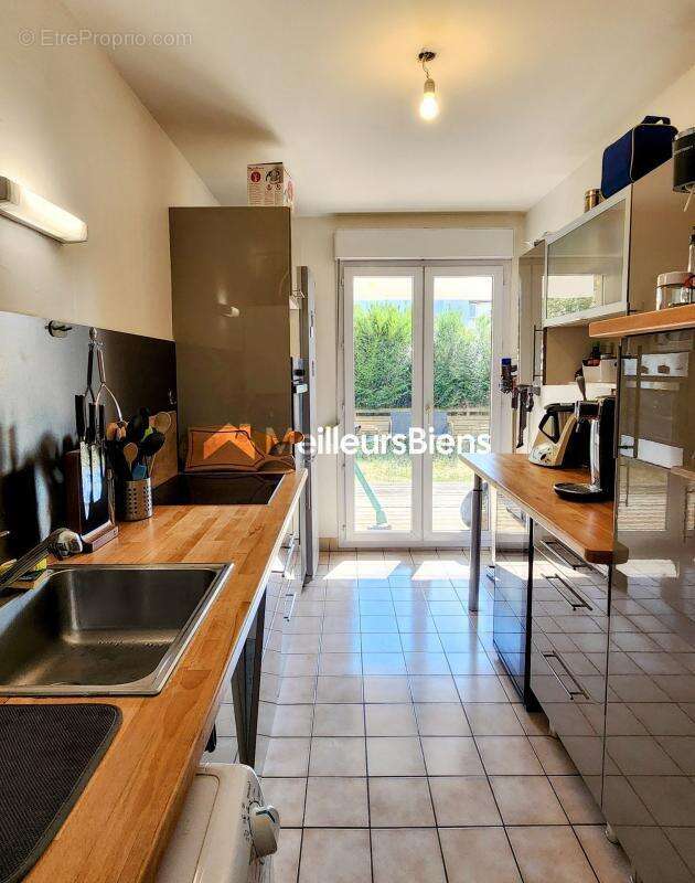  Appartement T3 avec jardin privatif, terrasse, parking et cave – Bld Emile Zola à Laxou - photo 2