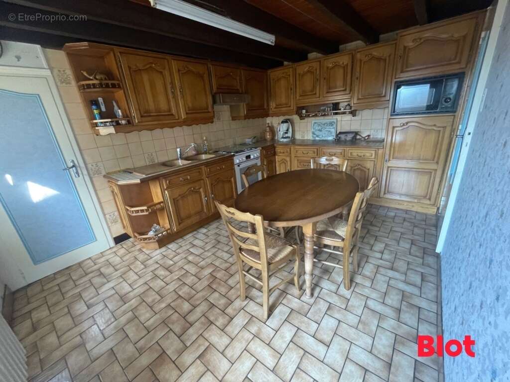 Maison à SAINT-GERMAIN-EN-COGLES