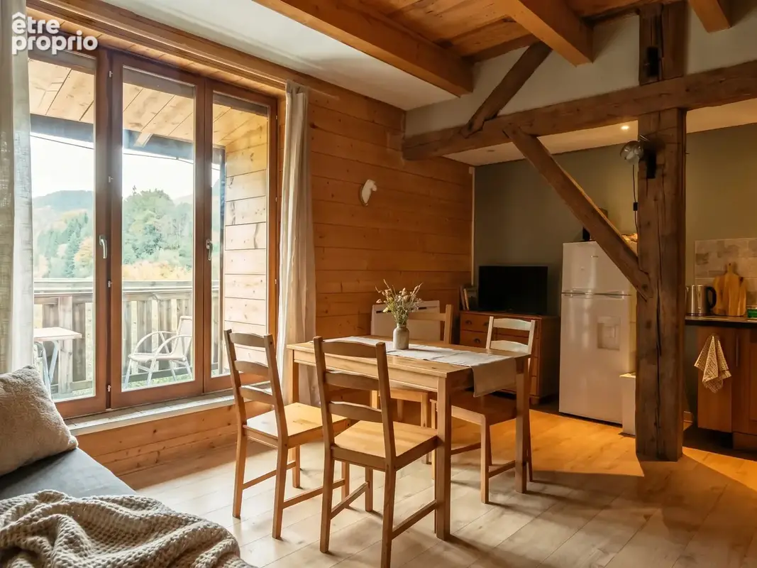 Appartement duplex avec balcon, box et parking - TANINGES - photo 1
